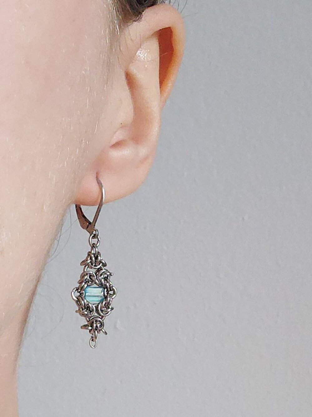 Silver and blue lever back earrings